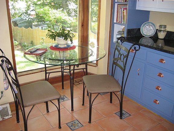 kitchen table and bay window view garden