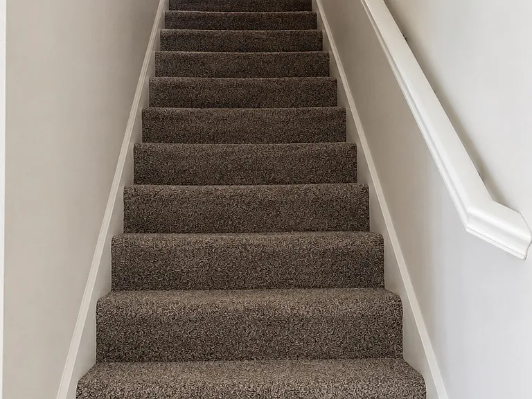 Staircase to the primary bedroom and two other rooms