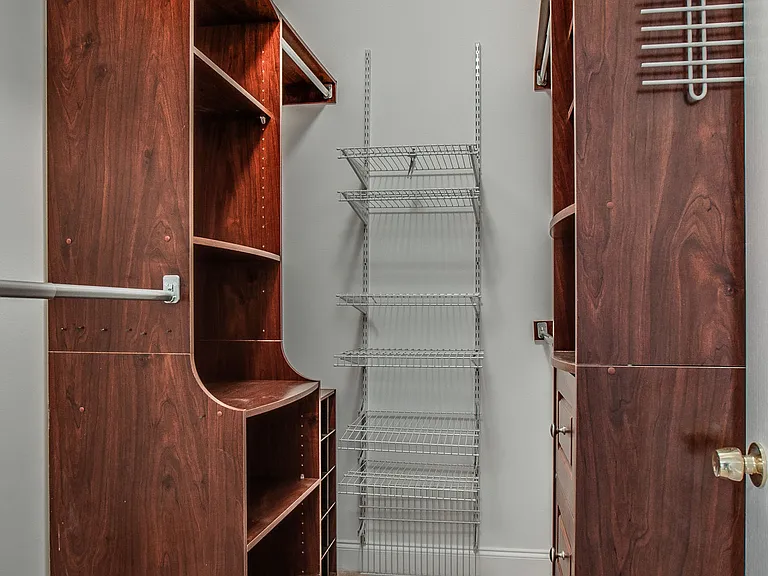Custom closet in Main bedroom.