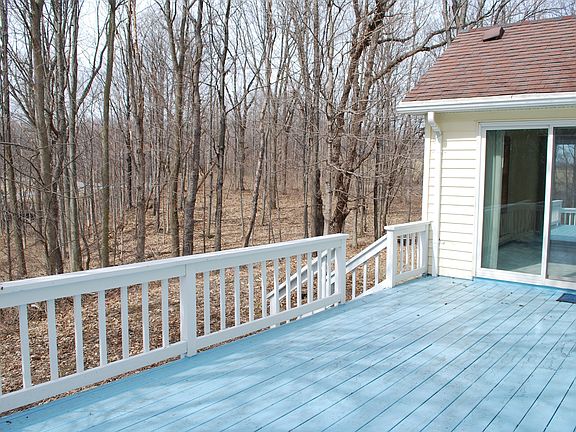 Sliding doors to deck are off the eat-in area.