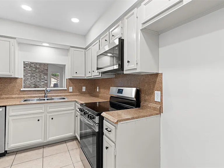 9306 Tooley Dr — Photo 12