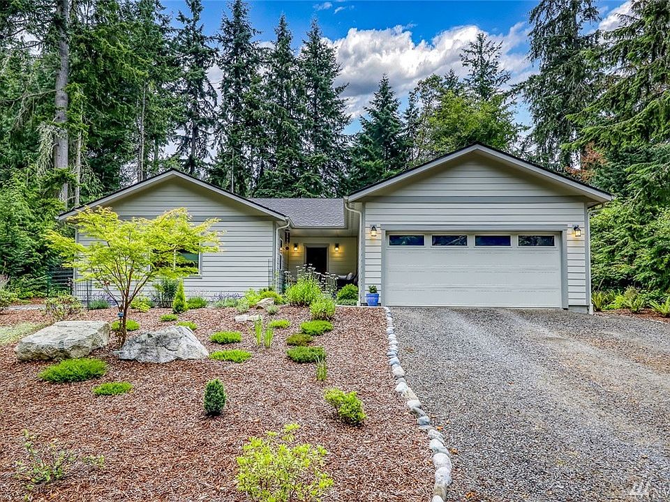 Built in 2017, this custom home is perched on 1/2 acre lot in desirable Kala Point location.
