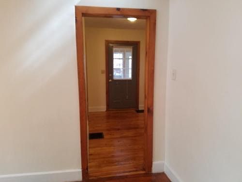 looking to front door from dining to foyer