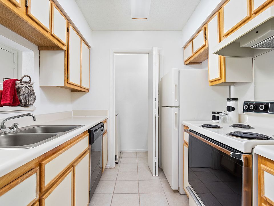 Kitchen Side View with Closet - The Augusta Apartments