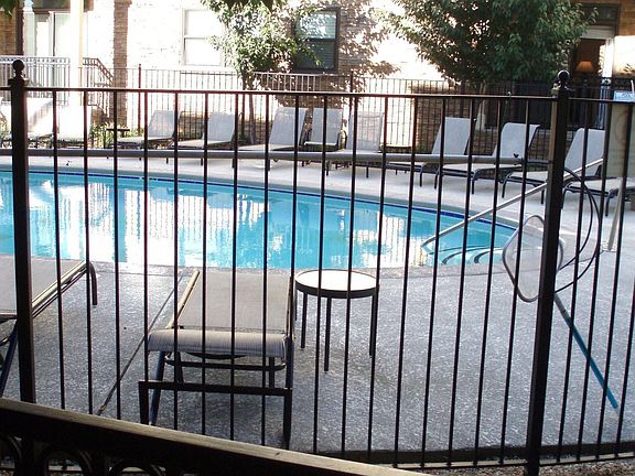 Each bedroom has a balcony, one overlooking the sparkling community pool