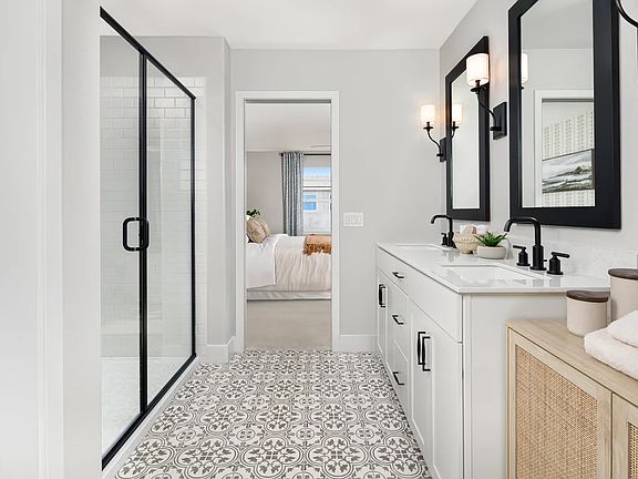 Primary bath with glass shower enclosure