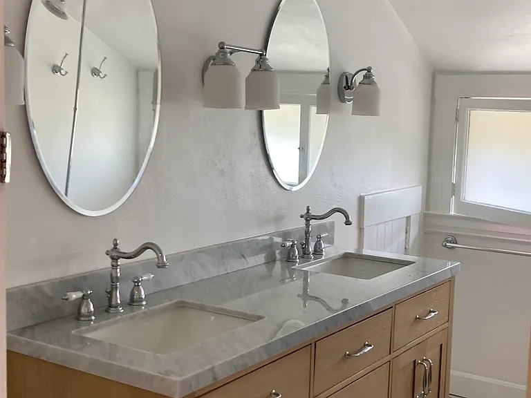 upstairs full bathroom double vanity with in-drawer outlet