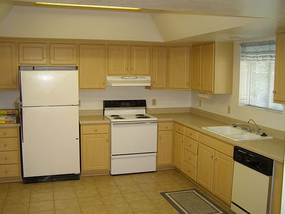 Very Large Kitchen with updated cabinets and tile floors