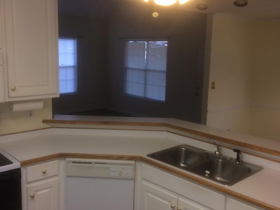 Kitchen looking into living room