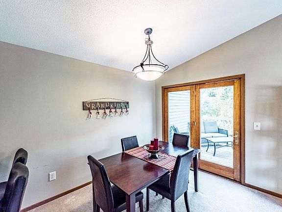 Vault continues into informal dining area where you walk out to the entertainment sized deck.