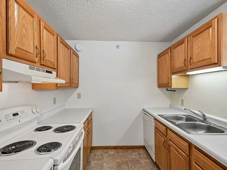 Bright and functional, the kitchen at Mill Pond Apartments features modern appliances and ample storage, perfect for culinary creations. Imagine your ideal living spaceexplore our available units today and find your new home!