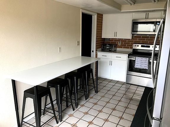 Kitchen offers space for a breakfast bar