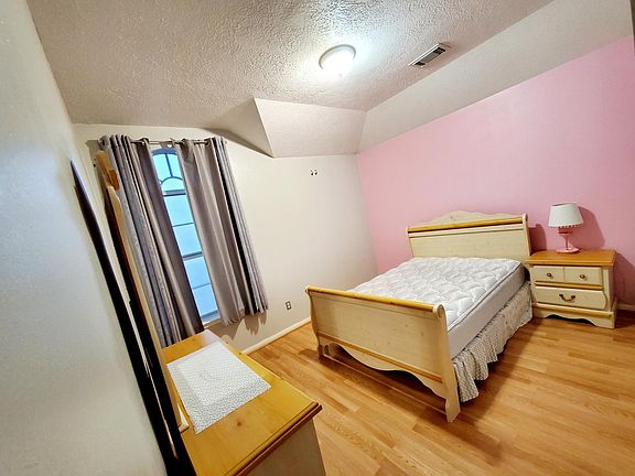 Bedroom located in the second floor with a walk-in closet