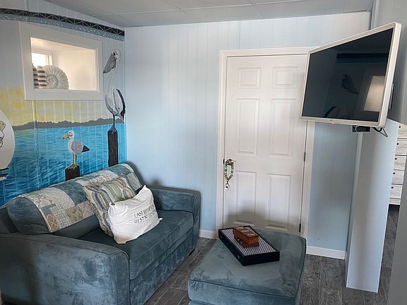 Sitting area. Loveseat is also a twin Pullout bed
