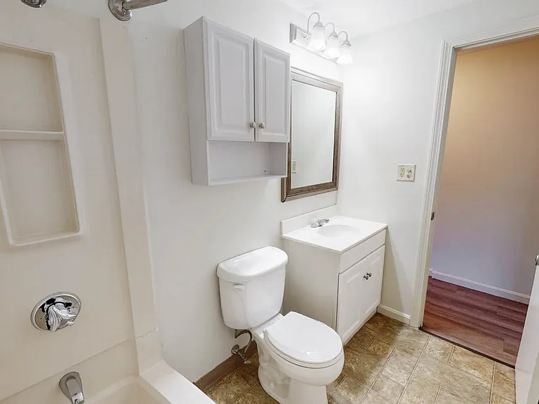 Modern, bright renovated bath with designer touches.