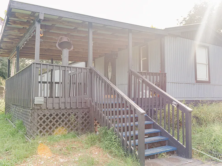 External view with large front deck