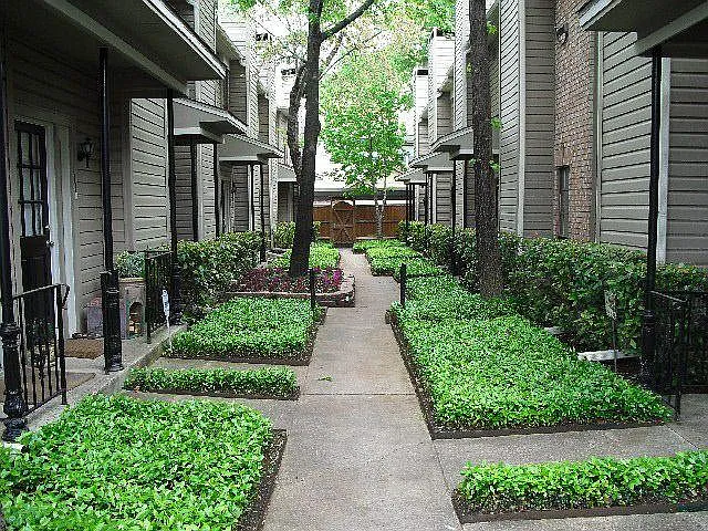 Gated courtyard leading to front door of the unit - directly in the center of the complex, adding extra security