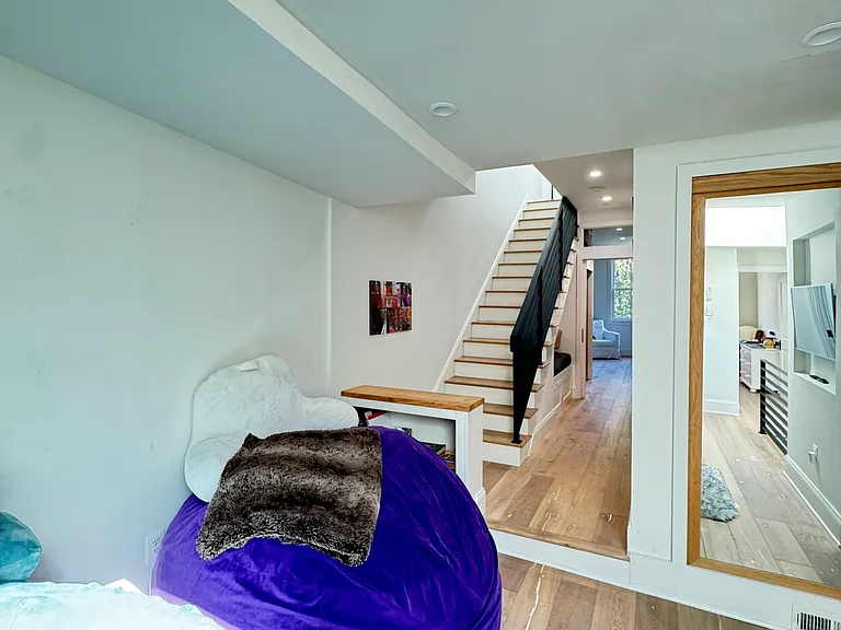 2nd Floor TV/Reading Room leading to Laundry Room and Rear Bedroom