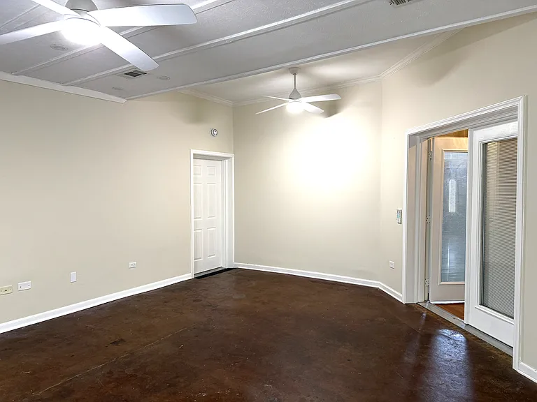 Heated and cooled, Huge area for Entertaining, Child's Playroom, Hobby room etc. Stained concrete floor, access to backyard