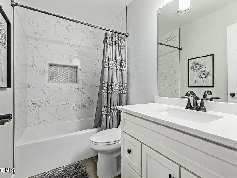 10617 W Daley Ln — Photo 26