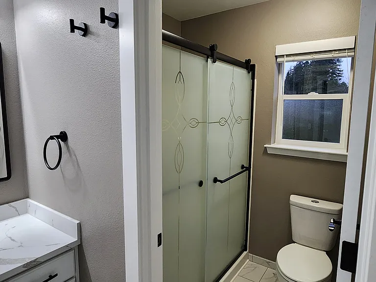 Master Bathroom with new shower entry.