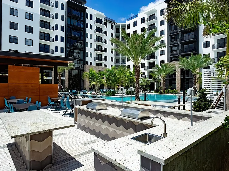 Our outdoor kitchen includes grills and lounge seating.