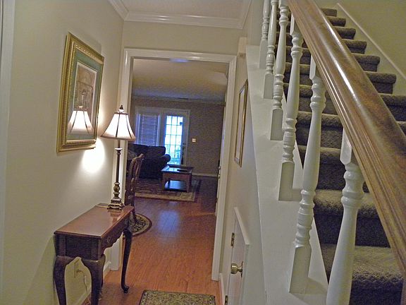Foyer with hardwood floors