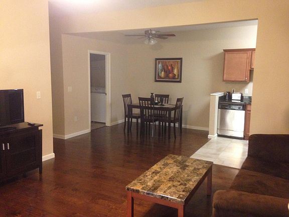Ample are for kitchen table and utility room complete with washer and dryer