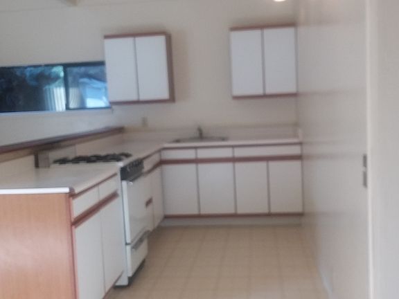 Refrigerator is not shown here but is in kitchen.