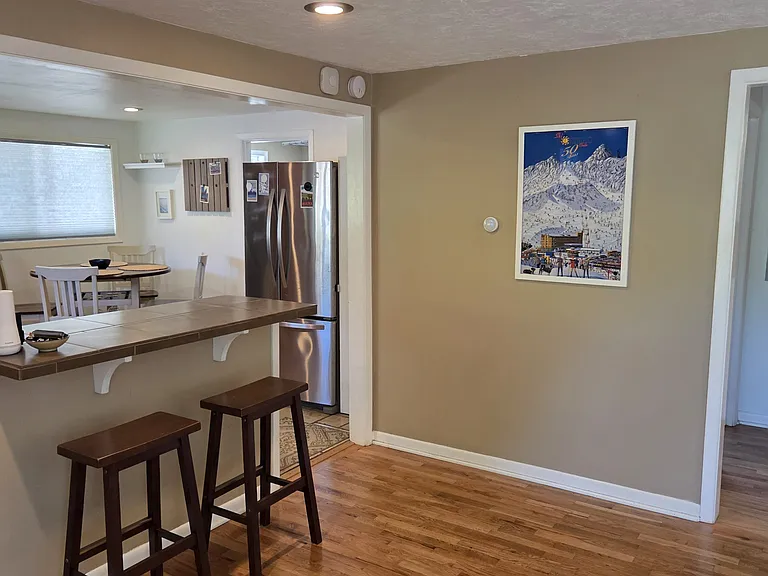 Livingroom from kitchen to bedrooms/bathroom entrance