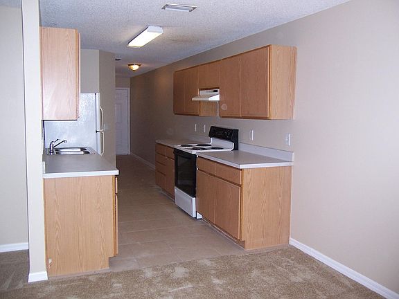 Carpet around 1 year old. Appliances about same age.