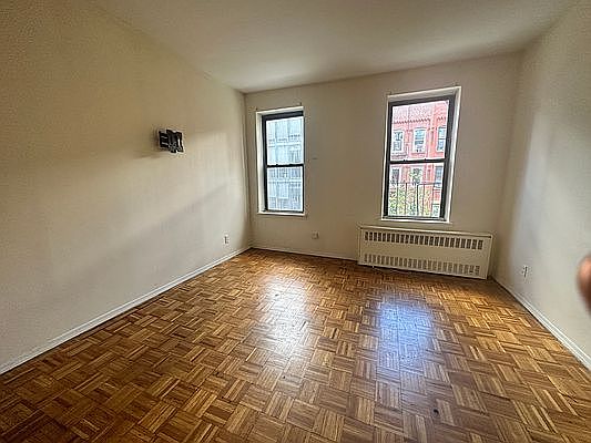 2nd image of 336 E 61st St APT 7
