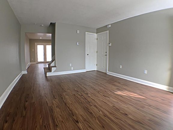 Living room view into dining area