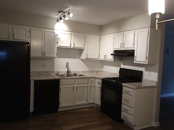 Upgraded kitchen with sleek black appliances