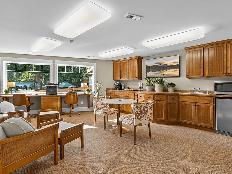 Comfortable lounge with workspace and refreshments