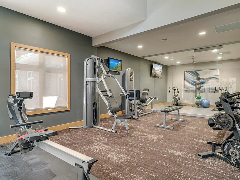 Stay fit in our fully equipped 24/7 fitness center, featuring cardio and strength training equipment.