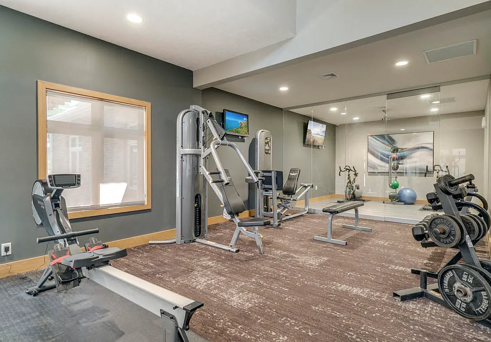 Stay fit in our fully equipped 24/7 fitness center, featuring cardio and strength training equipment.