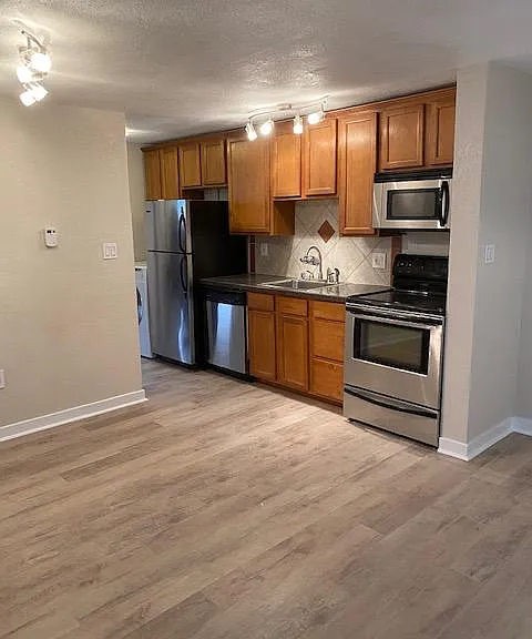Connected living space and kitchen.