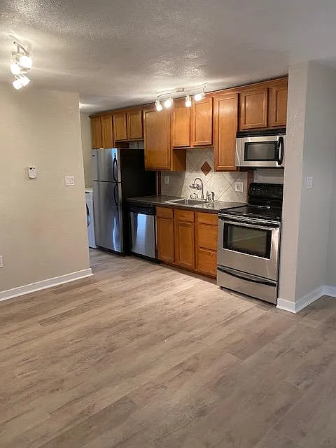 Connected living space and kitchen.