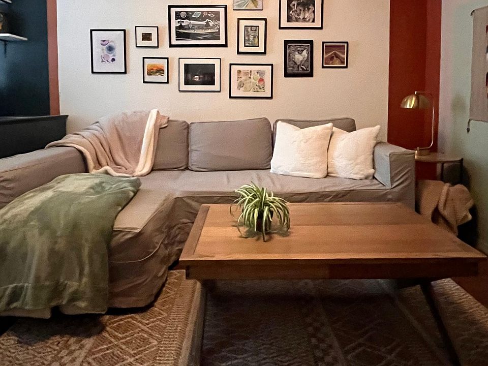 Living room. Has large smart tv.