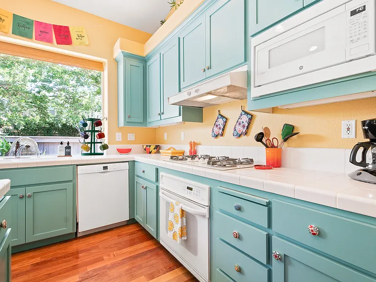 Includes kitchen appliances, Le Creuset cookware, dishes etc.