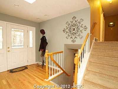 Hardwood Entry from covered front porch