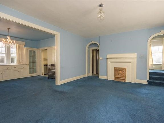 Impressive sized living room with charm and character around every corner.