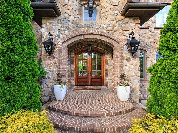 Gracious Entry with 10 ft Solid Mahogany Doors