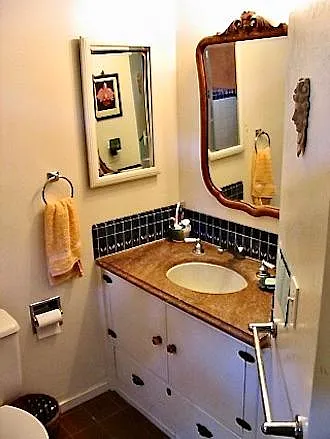 Bathroom has tub/shower.