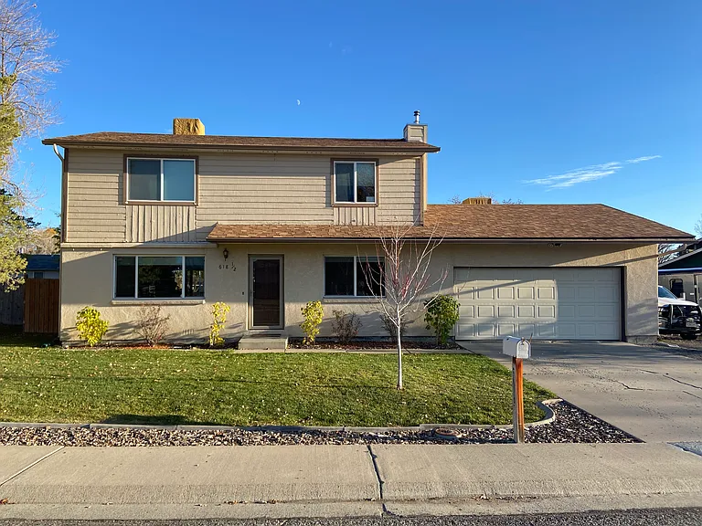 Enjoy a spacious yard and mature landscaping without the hassle_routine lawn care is included with rent. Attached garage providing covered parking and additional storage space.