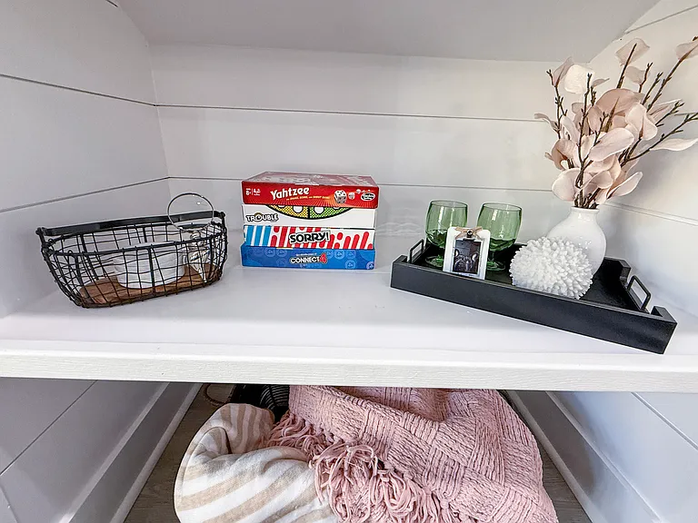 Board games and decor to make it feel like home included
