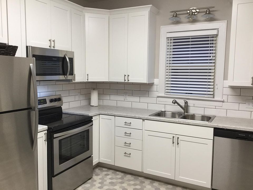 Kitchen with stainless steel appliances.