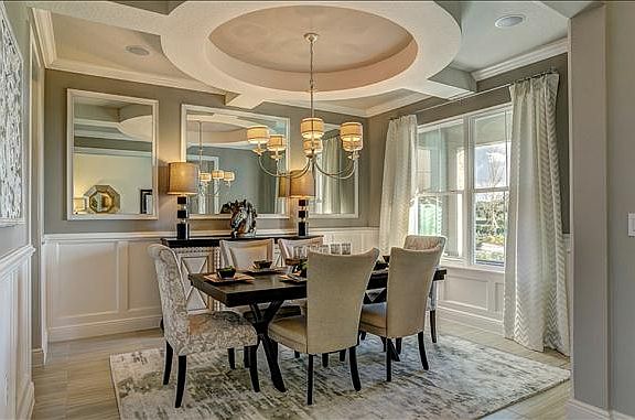 The formal dining connects to the kitchen