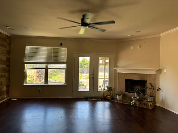Living Room with Fireplace and remote control fan